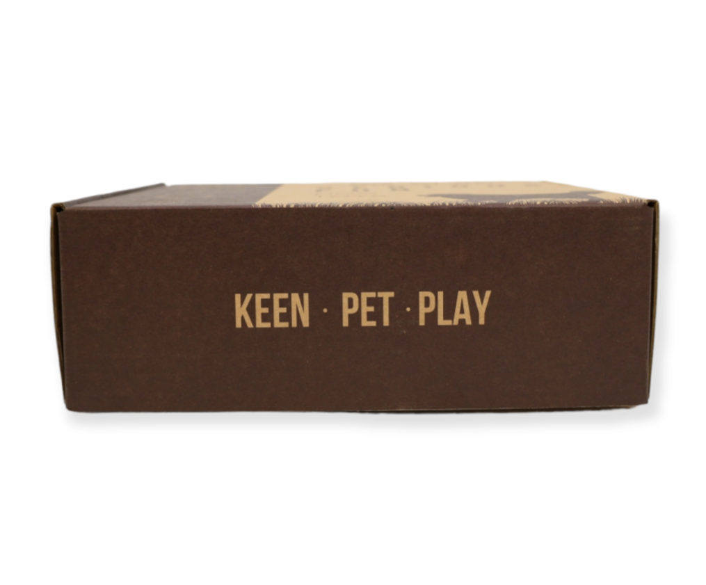 A collection of dog toys including a plush toy, three rope toys, a frisbee, and a treat ball. The toys are designed to relieve boredom and provide entertainment for dogs. This dog toy box is a perfect birthday gift for dog lovers and their furry friends. The toys are brightly colored and made from high-quality materials to ensure durability and long-lasting fun.